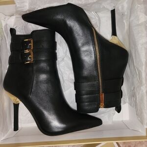 MICHAEL Michael Kors Black Heeled Boots with Gold Accents